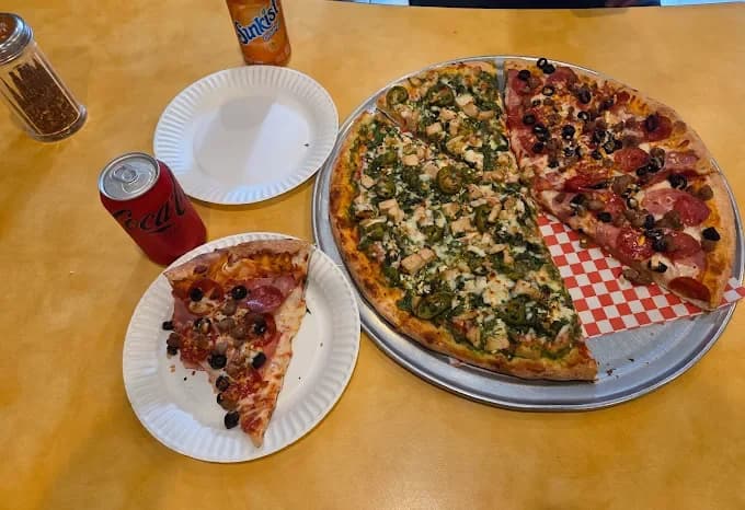 Pepperoni and pesto pizza at Yummy Pizza in San Francisco
